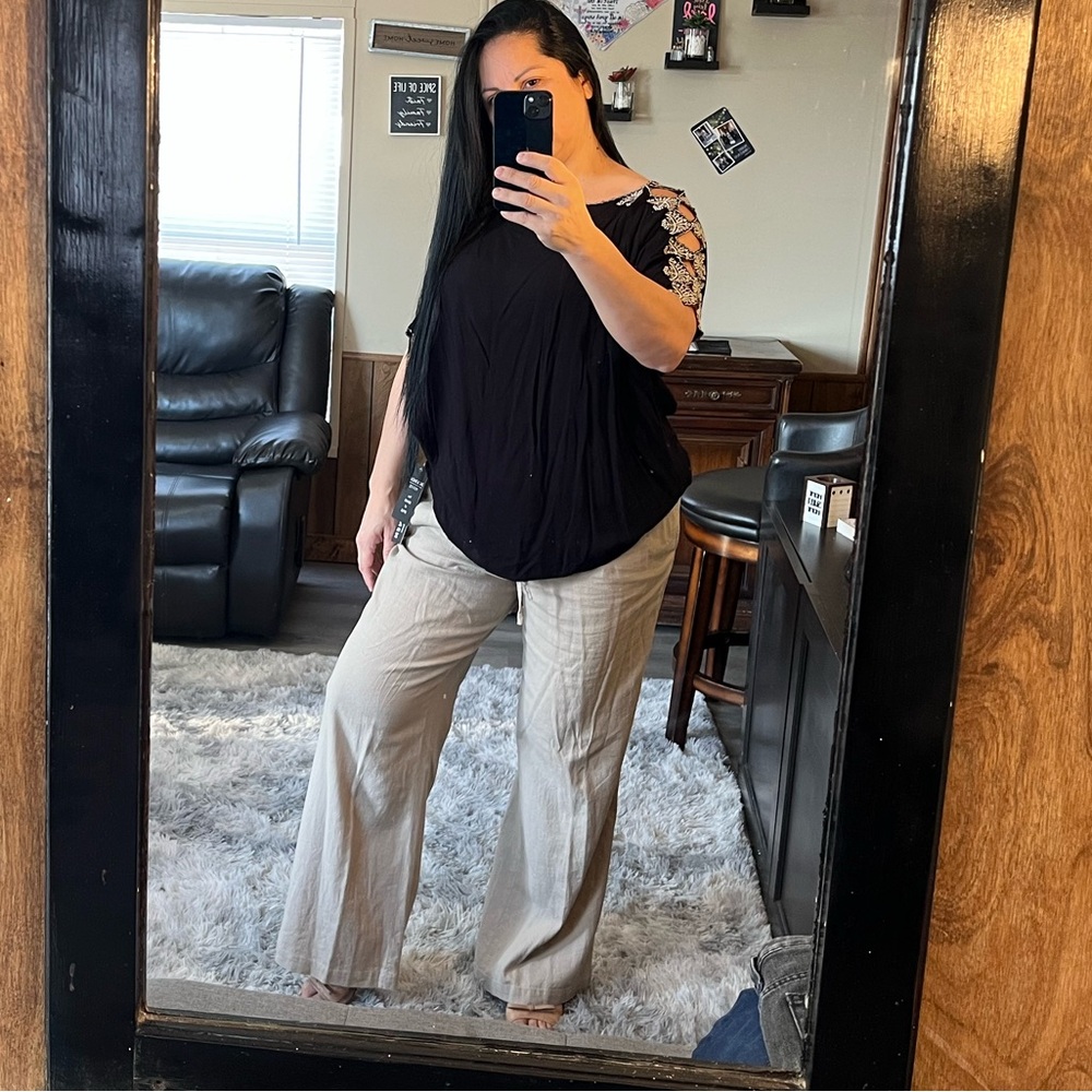 Black Floral Sleeve Top and Beige Pants